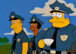 Chief Wiggum and Lou in "Wild Barts Can't Be Broken"
